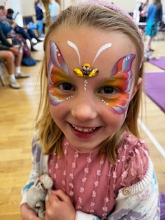girl with butterfly face paint in Shrewsbury